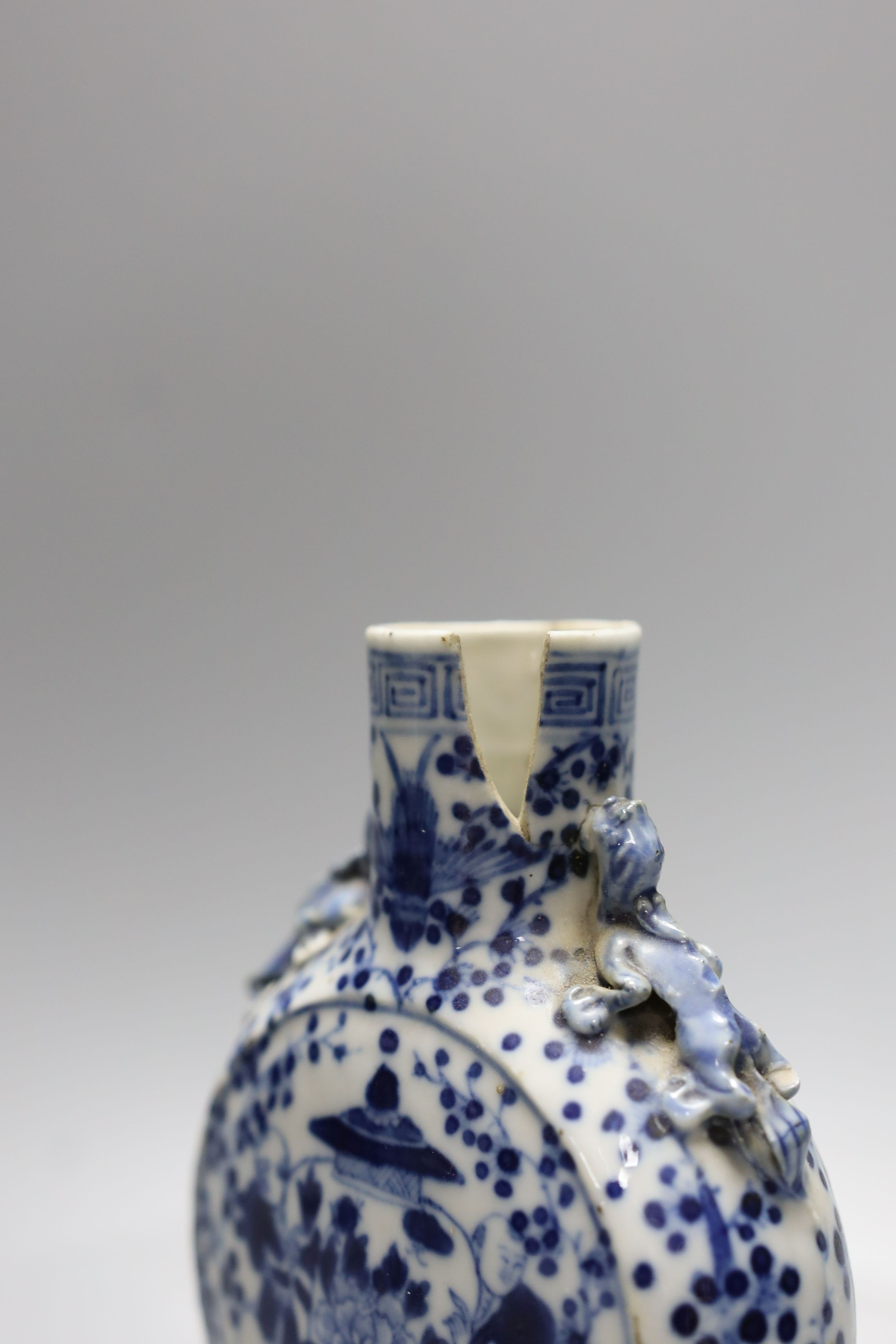 A pair of Chinese blue and white double gourd vases, similar moonflask and flower ornament 18cm
